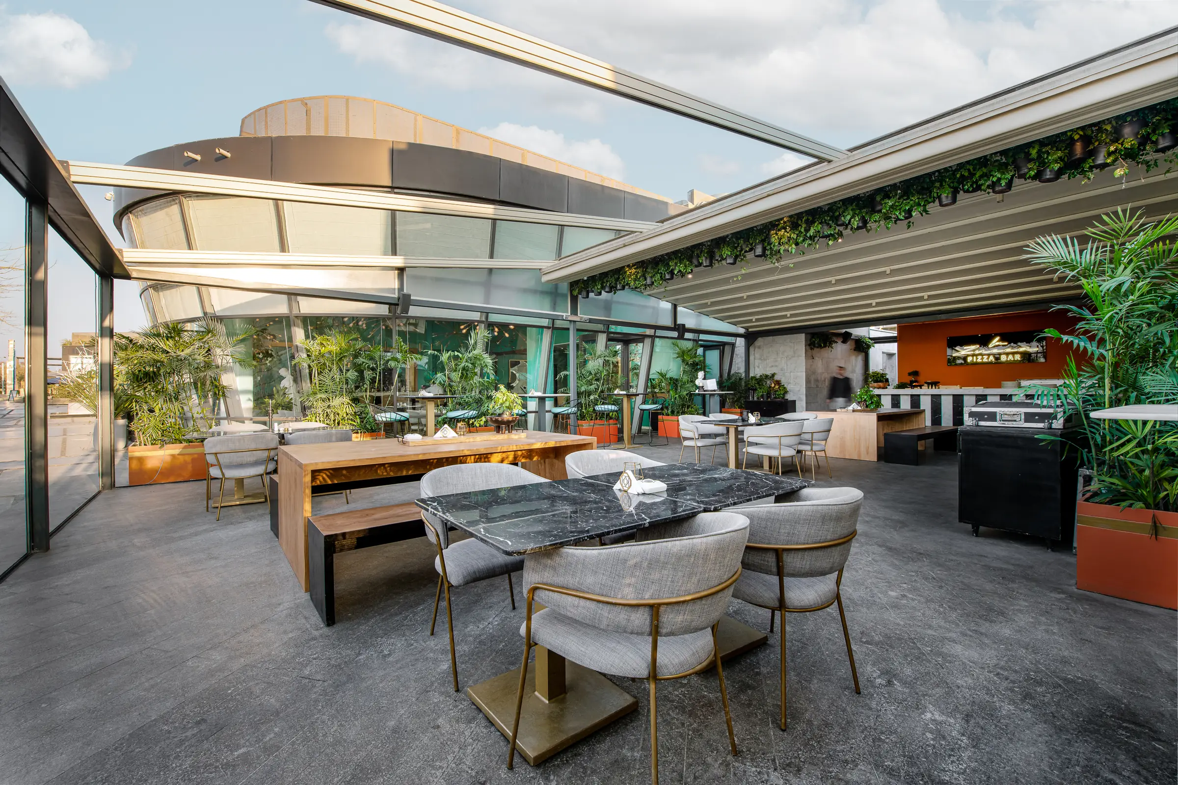 The terrace by day, the Walk beyond the glazing.